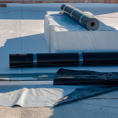 rolls of TPO membrane roofing