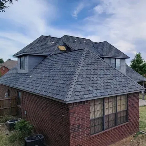 A home with an asphalt shingle roof
